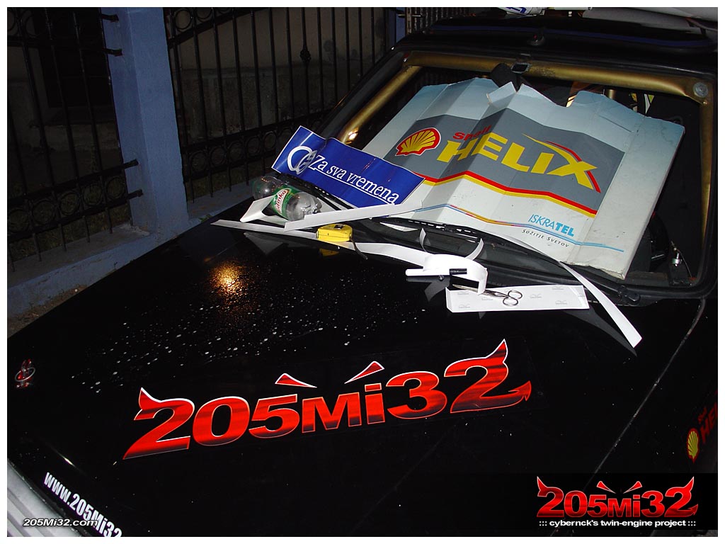 Digitally printed 205Mi32 logo sticker graces the front bonnet and rear engine's cover :-).