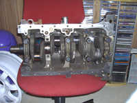 Assembling engineblock with one piston and rod assembly