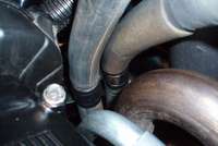 coolant hoses vs exhaust manifold
tight fit