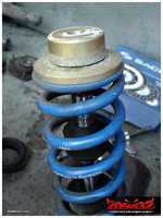 The shocks use their own special top mount bearings, which were in good condition.